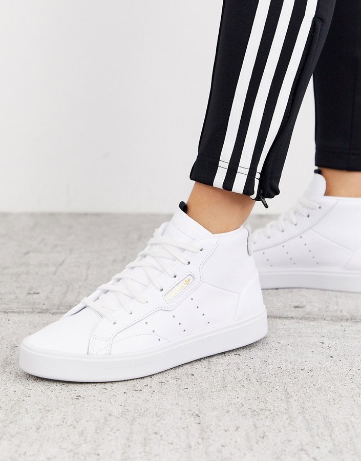 Sleek Mid Top sneakers in white and gray ShopStyle