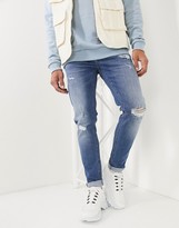Thumbnail for your product : ASOS DESIGN skinny jeans in mid wash blue with rips and destroy