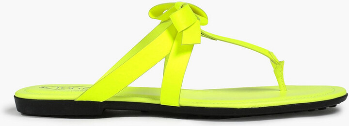 neon yellow flip flops