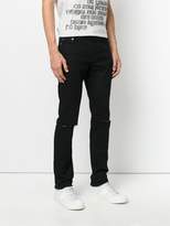 Thumbnail for your product : Saint Laurent busted knee slim fit jeans