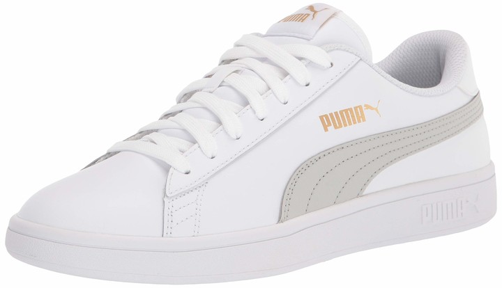 white and gold pumas