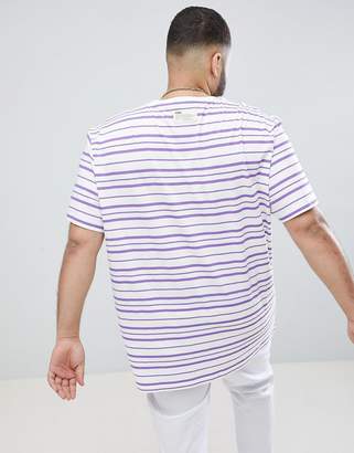 Puma Plus organic cotton t-shirt in retro stripe in purple Exclusive at ASOS