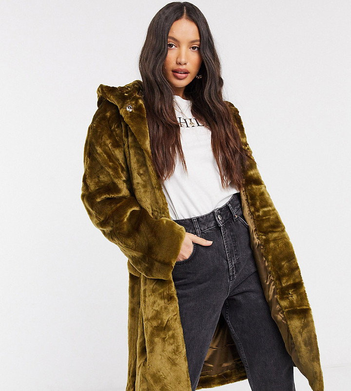 green coat with fur hood