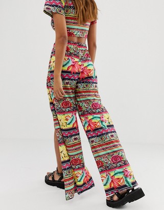 ASOS DESIGN split front jersey beach pants in tropical tile print coord