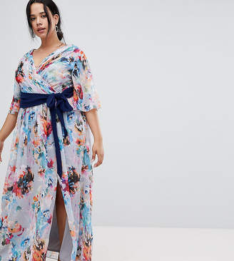 Little Mistress Plus plunge front maxi dress with cape detail in full bloom print