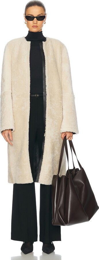 Totême Zipped Teddy Shearling Coat in Cream