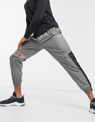Puma Training woven track pants in gray - ShopStyle