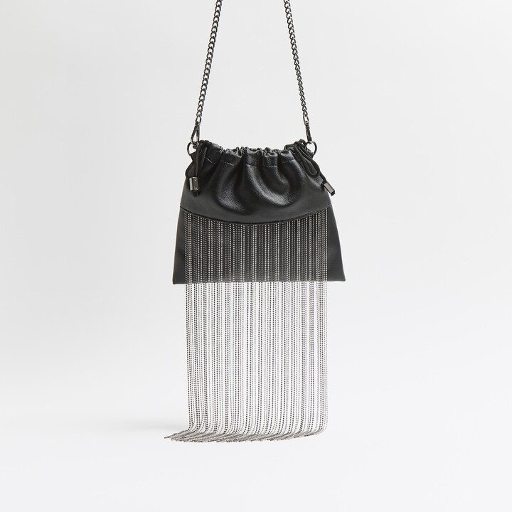 black leather handbolsas river island