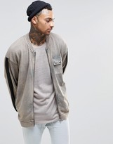Thumbnail for your product : ASOS Oversized Jersey Bomber Jacket With Wash & Taping