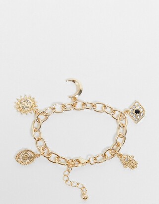 ASOS DESIGN charm bracelet with celestial charms in gold tone