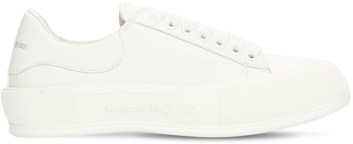 black leather plimsolls