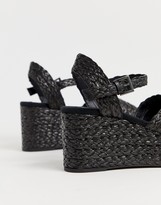Thumbnail for your product : Stradivarius crossover raffia wedge sandals in black