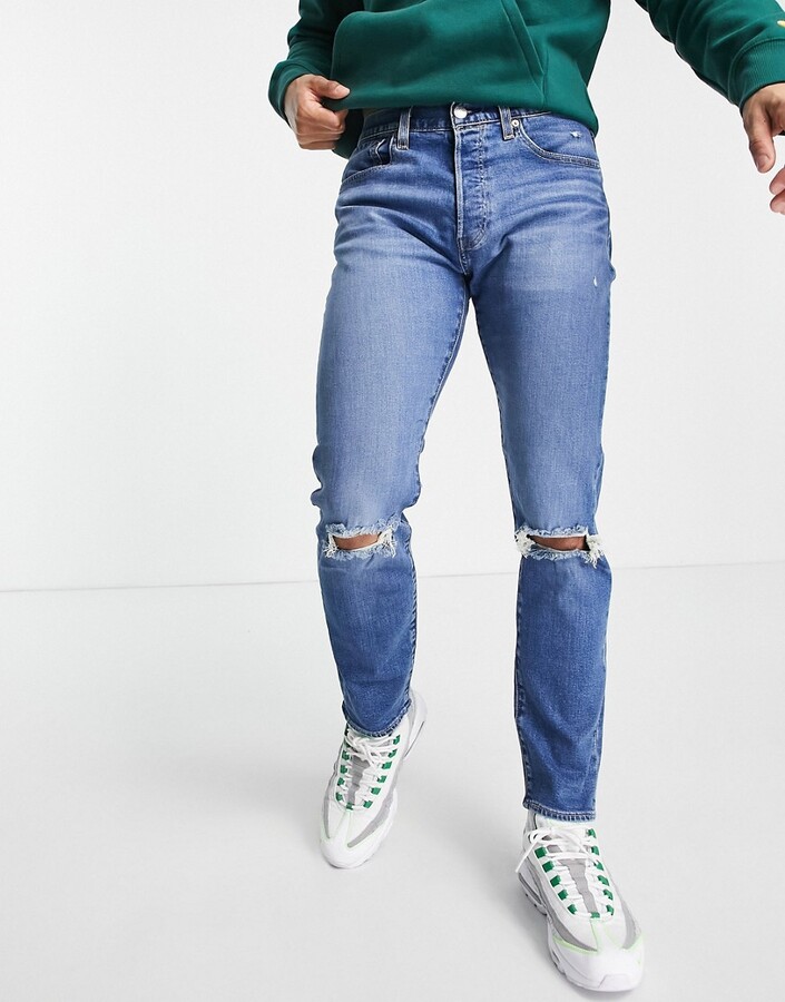 black ripped jeans mens levis