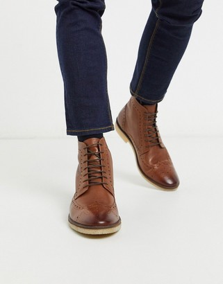 ASOS DESIGN brogue boots in tan leather with natural sole - ShopStyle