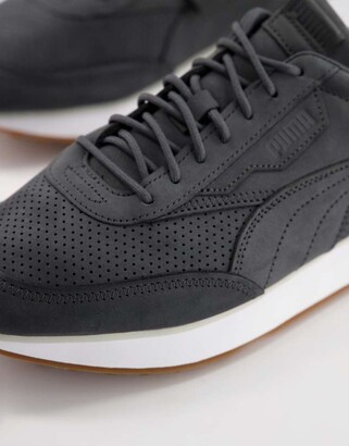 Puma future rider premium sneakers in black with gum sole Clearance