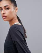Thumbnail for your product : Reebok Training Mesh Panel Crop Long Sleeve Top In Black
