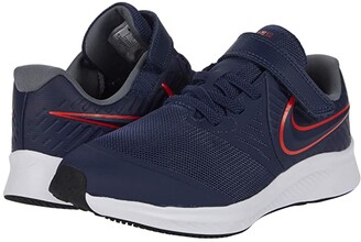 navy blue and grey nike shoes