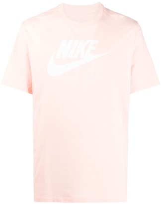 white pink nike shirt