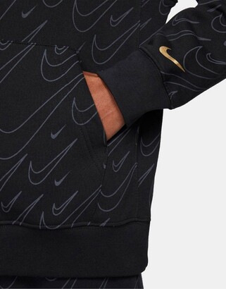 Nike all over swoosh print hoodie in black and gold - ShopStyle