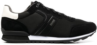 black and gold boss trainers