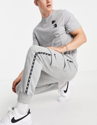 Nike Repeat taping fleece cargo joggers in grey - ShopStyle Trousers