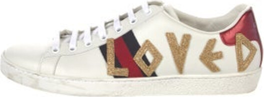 Gucci Leather Low Top Sneakers Blue, Gold, Red & White Printed Web Accent Rubber Trim Embroidered & Glitter Accents Round-Toes Lace-Up Closure at Uppers Designer