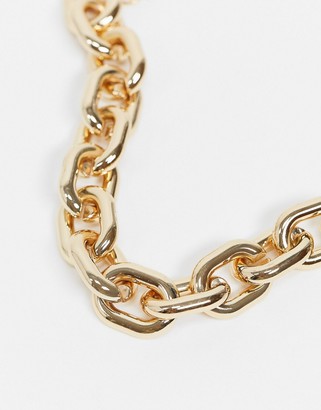 ASOS DESIGN anklet in statement hardware chain in gold tone