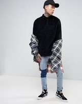 Thumbnail for your product : ASOS Longline Long Sleeve Polo Shirt In Black Velour With Rugby Styling