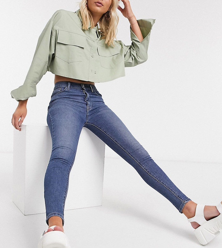 Collusion x001 highwaisted skinny jeans in mid blue - ShopStyle