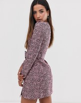 Thumbnail for your product : Fashion Union structured bodycon dress in abstract print with belt detail