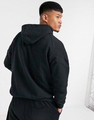 puma iconic hoodie in triple black