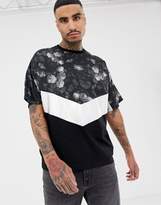 Thumbnail for your product : ASOS Design DESIGN oversized t-shirt with floral chevron yoke and silver foil colour blocking panel