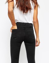 Thumbnail for your product : ASOS Ridley Skinny Jeans In Washed Black With Ripped Knee