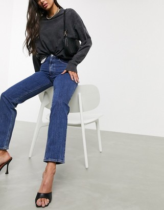 Asos Tall ASOS DESIGN Tall High rise stretch 'slim' straight leg jeans in mid vintage wash