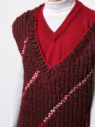 Necessity Sense Domini layered knit vest
