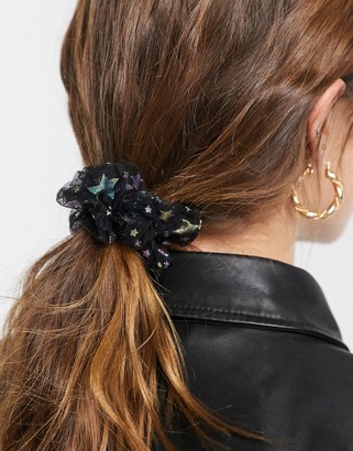 Topshop scrunchie hair tie in black organza with star print - ShopStyle