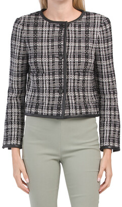 black jacket with white trim