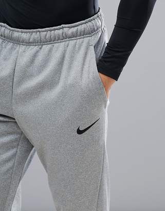 Nike Training therma tapered joggers in grey 800193-091