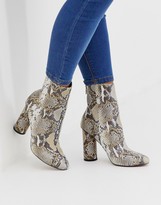 Thumbnail for your product : ASOS DESIGN Egypt leather heeled boots in snake