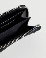 Thumbnail for your product : ASOS Design DESIGN faux leather mini zip around wallet in black with emboss