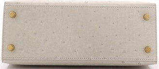 Noble1 Pte Ltd - BNIB Hermes Kelly pochette gris perle ostrich gold  hardware Stamp U Full set with original receipt
