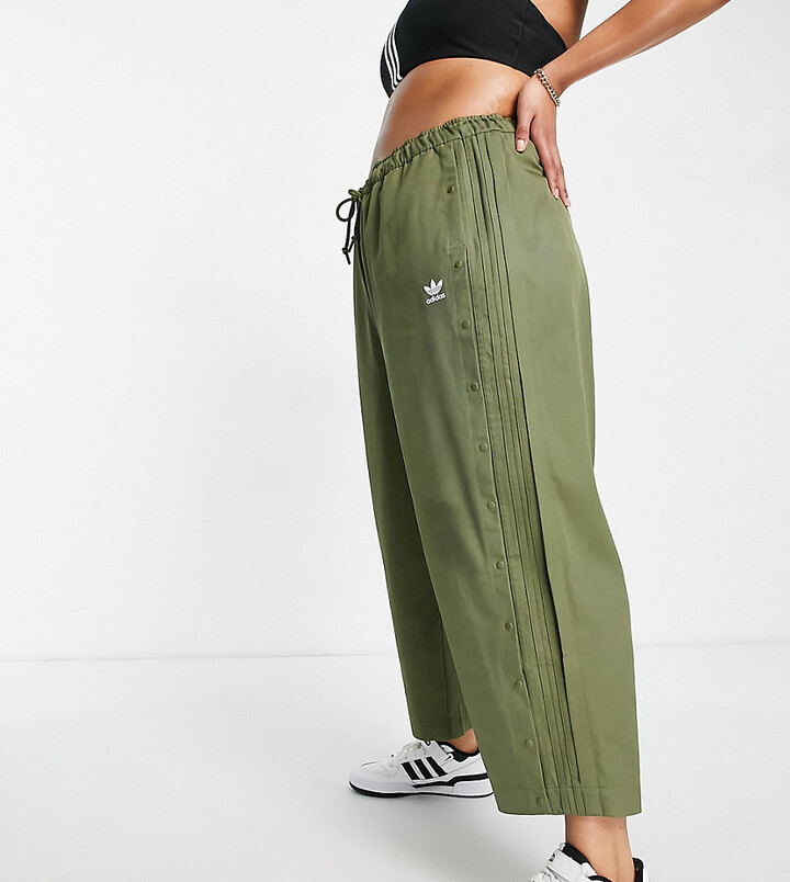 adidas Plus relaxed pant with popper detail in khaki ShopStyle