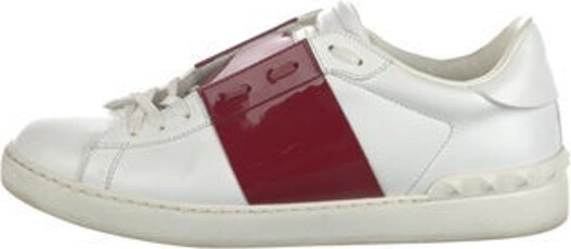 Valentino Leather Low Top Sneakers White Rockstud Accents Patent Leather Trim Round-Toes with Studded Accents Lace-Up Closure at Uppers Includes Dust Bag Unfortunately, due to restrictions, this item may not be eligible for shipping in all areas.