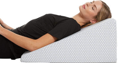 https://img.shopstyle-cdn.com/sim/a0/eb/a0eb10907735abc44ef53e7b7451af95_best/allsett-health-cooling-wedge-pillow-10-inch-bed-wedge-pillow-24-inch-wide-incline-support-cushion-for-lower-back-pain.jpg