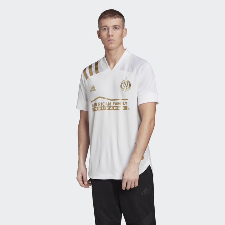 gold adidas shirt