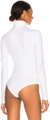 Calvin Klein Turtleneck Bodysuit in Optic White | FWRD