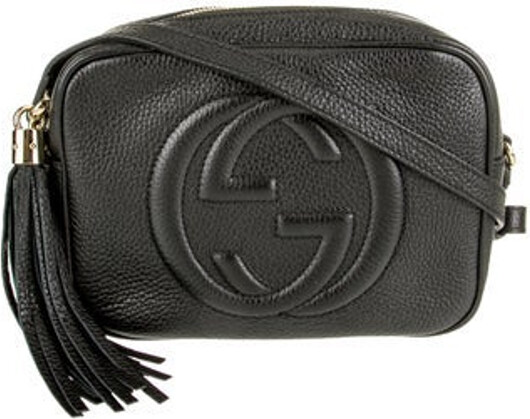 Gucci Crossbody Bag Black Leather Interlocking G Logo Gold-Tone Hardware Single Adjustable Shoulder Strap Tassel Accents Canvas Lining & Dual Interior Pockets Zip Closure at Top Includes Dust Bag Unfortunately due to restrictions this item may not be eligible for shipping in all areas.