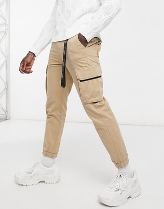 Bershka cargo pants with key chain in camel - ShopStyle