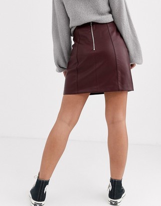 New Look Petite leather look mini skirt in burgundy