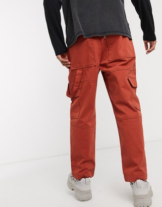 The Ragged Priest utility cargo trousers in rust